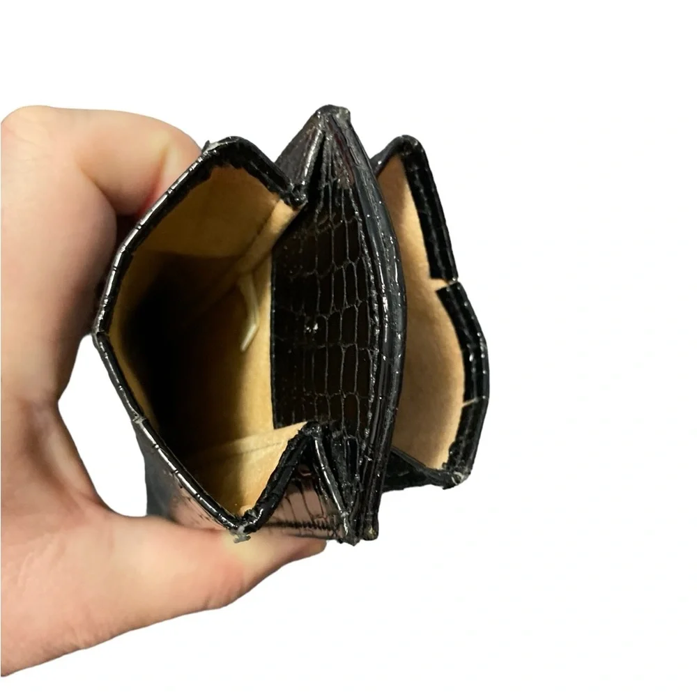 Double-sided black leather eyeglasses case. Holds 2 pairs of glasses. Used